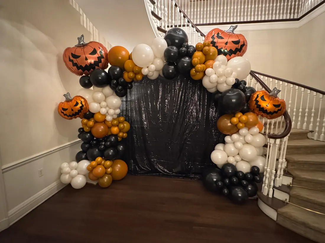 Pumpkin and black balloon arch for Halloween